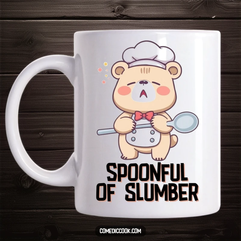 Funny Sleepy Bear Chef Mug shows a tired bear yawning widely while holding an oversized spoon, representing morning fatigue and culinary dreams.