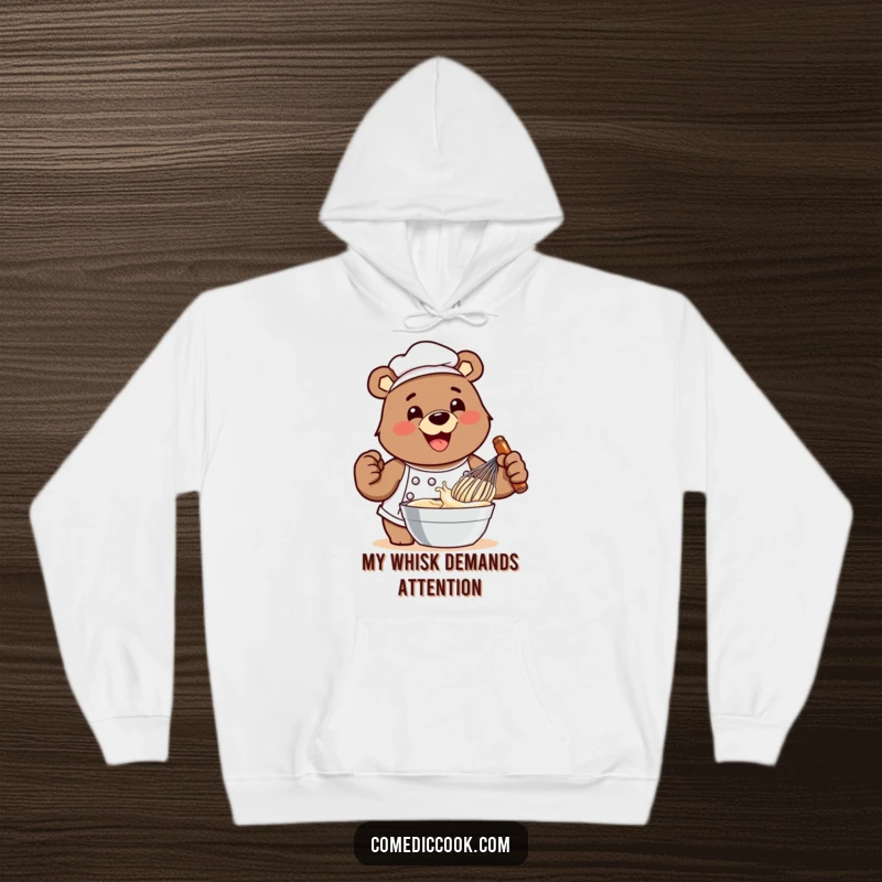 Funny bear chef hoodie featuring him whisking batter with extreme enthusiasm, perfect for cozy cooking sessions and a cheerful vibe.