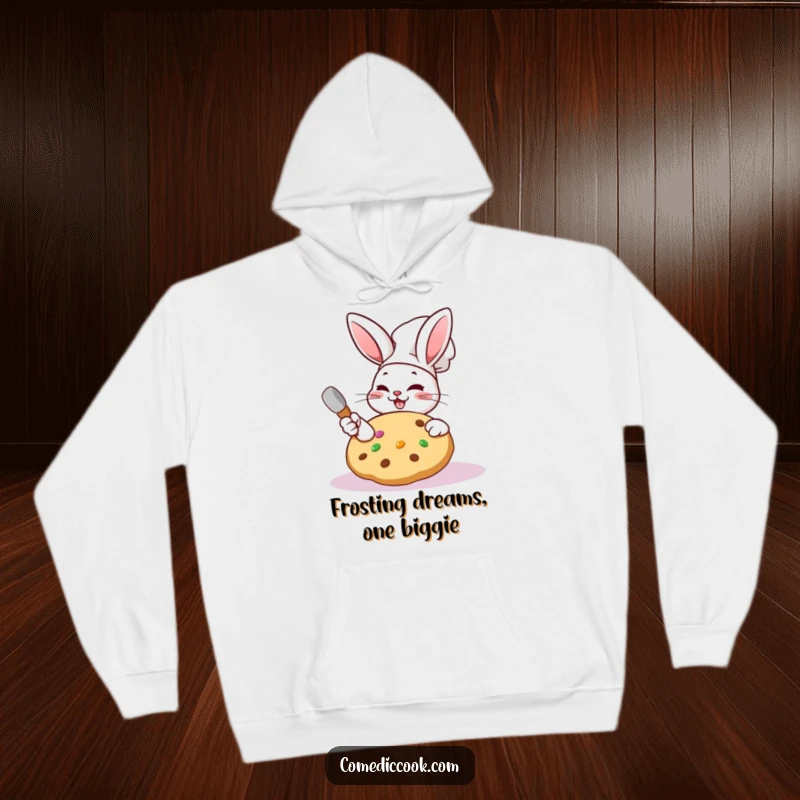 Funny Kawaii rabbit chef hoodie with a character frosting a cookie, perfect for cozy baking sessions.