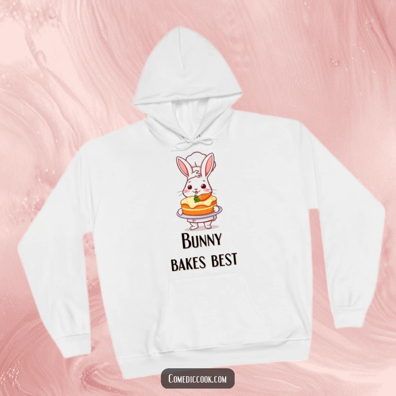 Funny hoodie with a proud rabbit chef presenting a perfectly baked carrot cake, perfect for bakers.