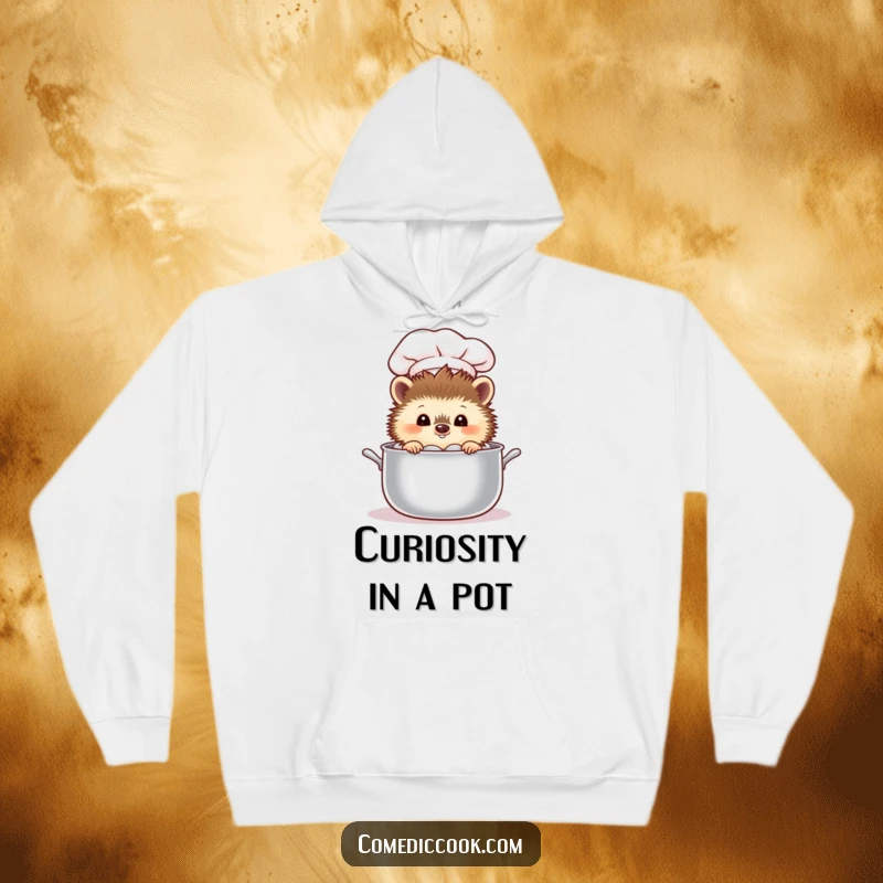 Funny curious hedgehog chef peeking into a steaming pot, depicted on a warm and humorous hoodie.