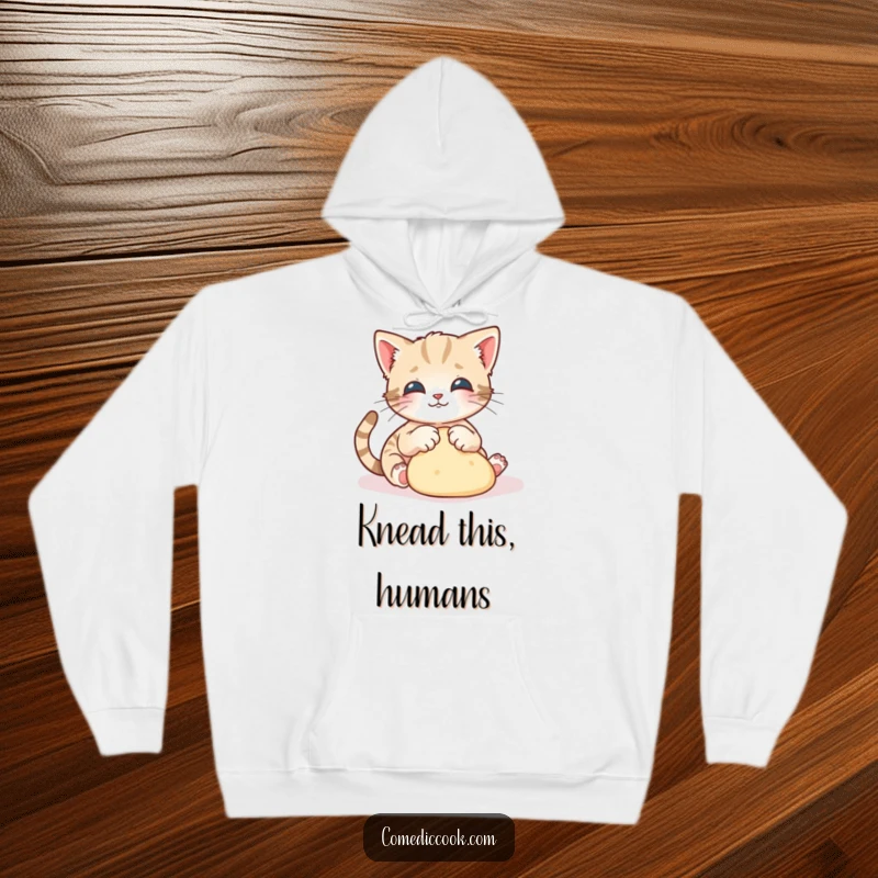 Funny kitten hoodie with a playful kitten gracefully kneading dough with tiny paws, perfect for cozy days.