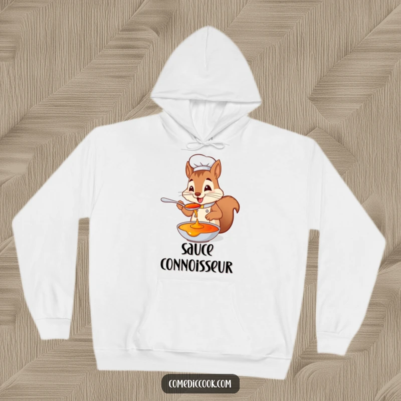 Funny squirrel chef hoodie with a playful squirrel tasting sauce from a spoon with delight, perfect for staying warm and sharing smiles, a great gift.