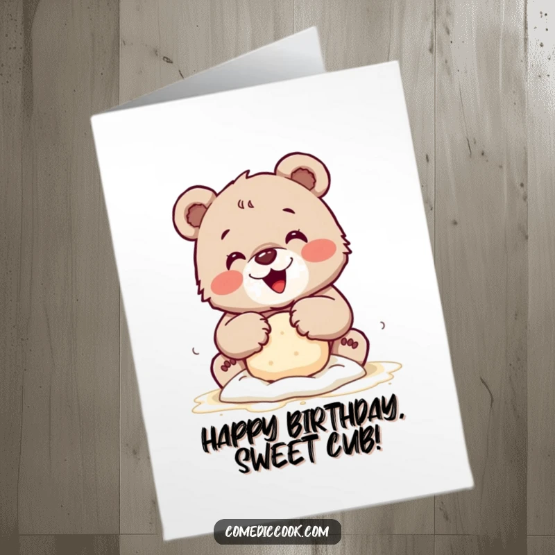 Free Printable Birthday Card: A tiny bear cub with flour-dusted paws joyfully kneading dough, spreading baking cheer.