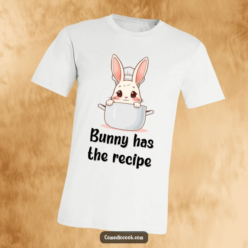 Funny Rabbit Chef T-Shirt: Adorable bunny chef peeking into a steaming pot with wide, curious eyes, perfect for foodies.