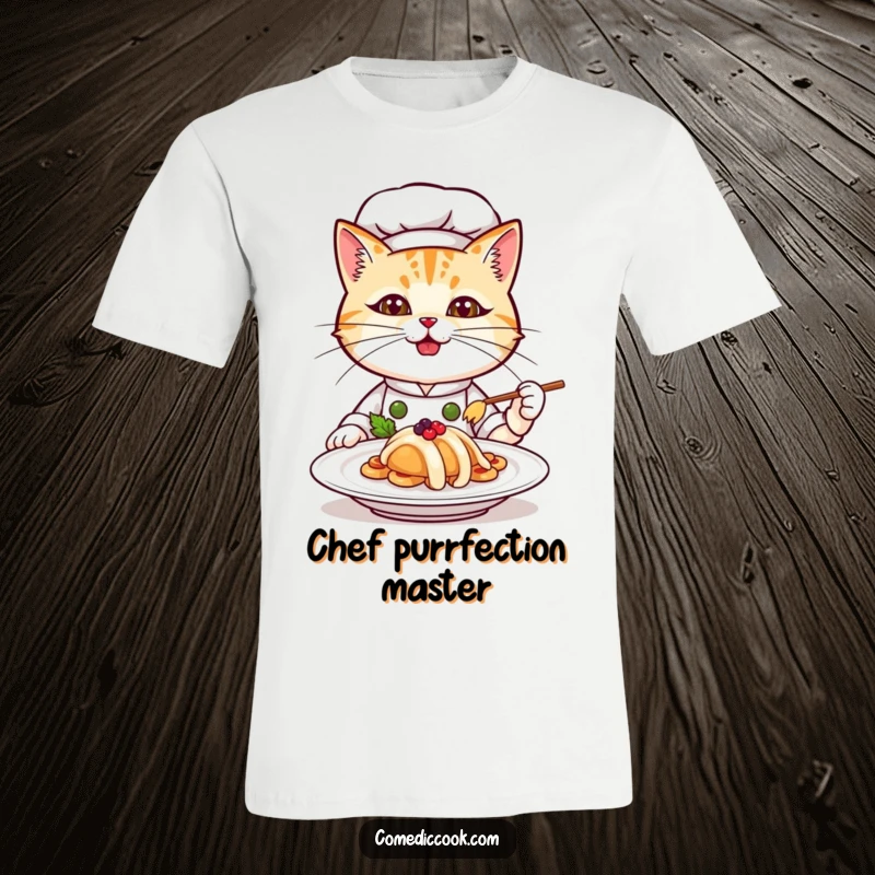 Funny cat chef t-shirt, a determined kitten chef presenting a fancy meal with a proud expression, ideal for food lovers.