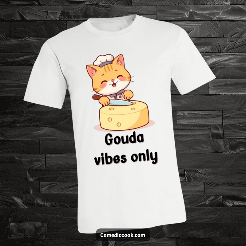 Funny Cat Chef T-Shirt featuring a happy cat with a determined look slicing a massive wheel of cheese, a funny and delightful gift.