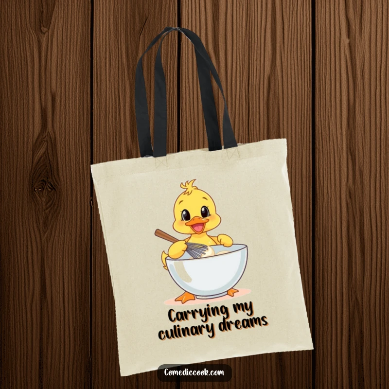 Funny cheerful duckling baker on a tote bag, whisking batter with enthusiasm, a cute and funny accessory.