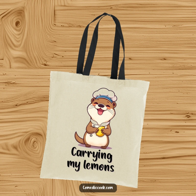 Funny otter chef tote bag, a cheerful character giggling while squeezing a lemon, great for shopping and carrying items with a zesty, humorous theme.